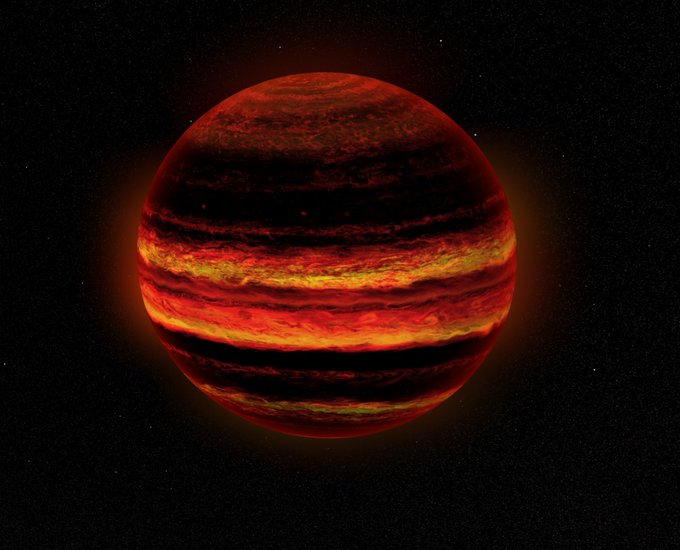 A brick-red spherical body, the artist’s rendition of a brown dwarf, floats against the black of deep space liberally dotted with stars. The body itself is striped with roughly two dozen narrow longitudinal bands of fiery oranges and yellows alternating with cooler browns. Swirls in the orange-yellow-stripes give the impression of a chaotic, swirling atmosphere.